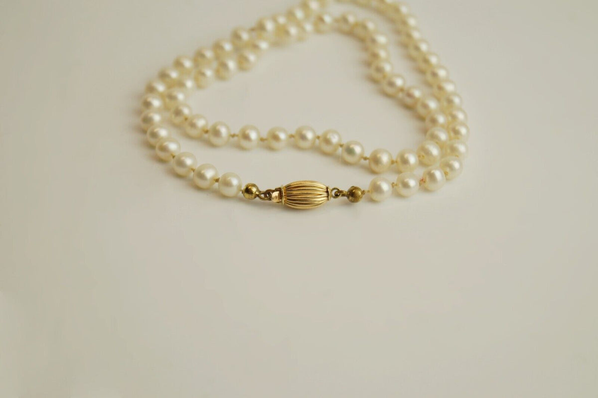Perlenkette mit Tiffany&Co Perlen 585 und 750er Gelbgold