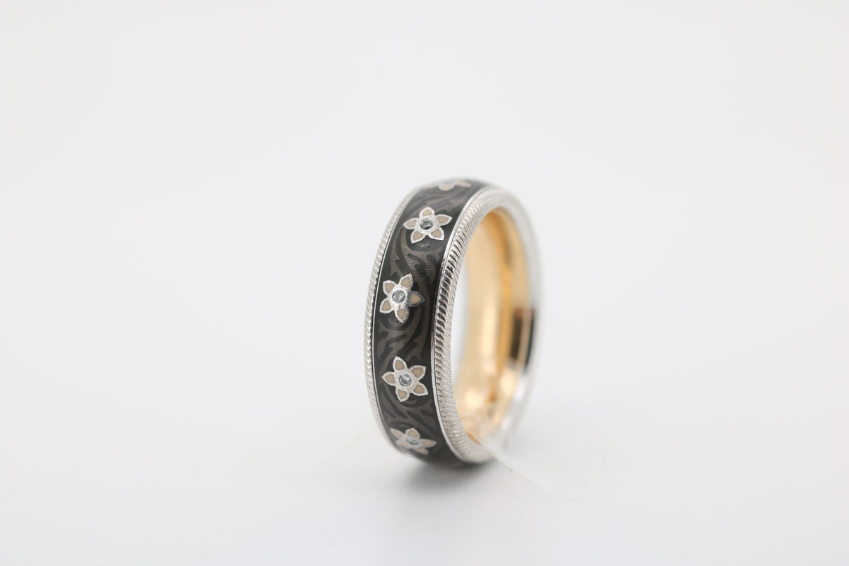 Wellendorff Blütenengel11 Diamanten, aus 750 Weiß/Gelbgold – Ringgröße 52