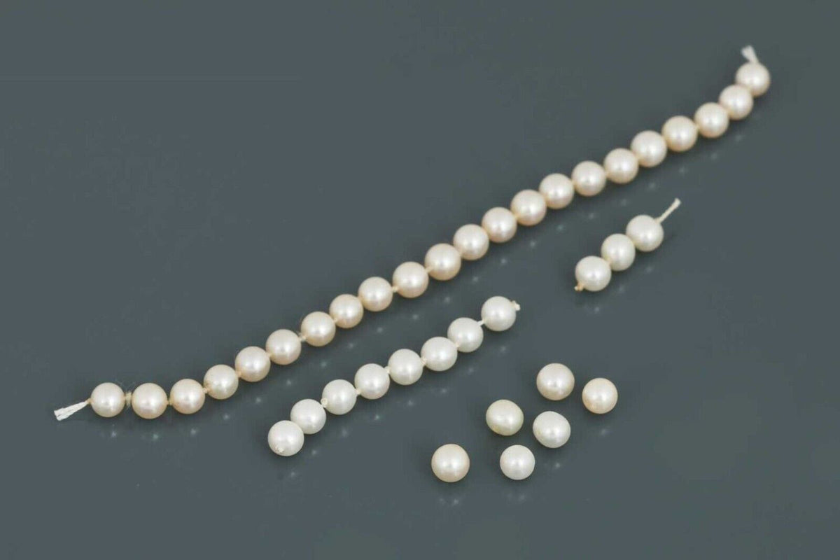 Perlenkette mit Tiffany&Co Perlen 585 und 750er Gelbgold