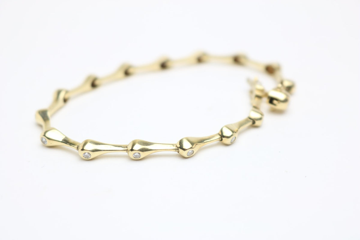Elegantes Tropf Armband für Damen aus 585 Gelbgold mit 15 Diamanten 0.40ct 19cm