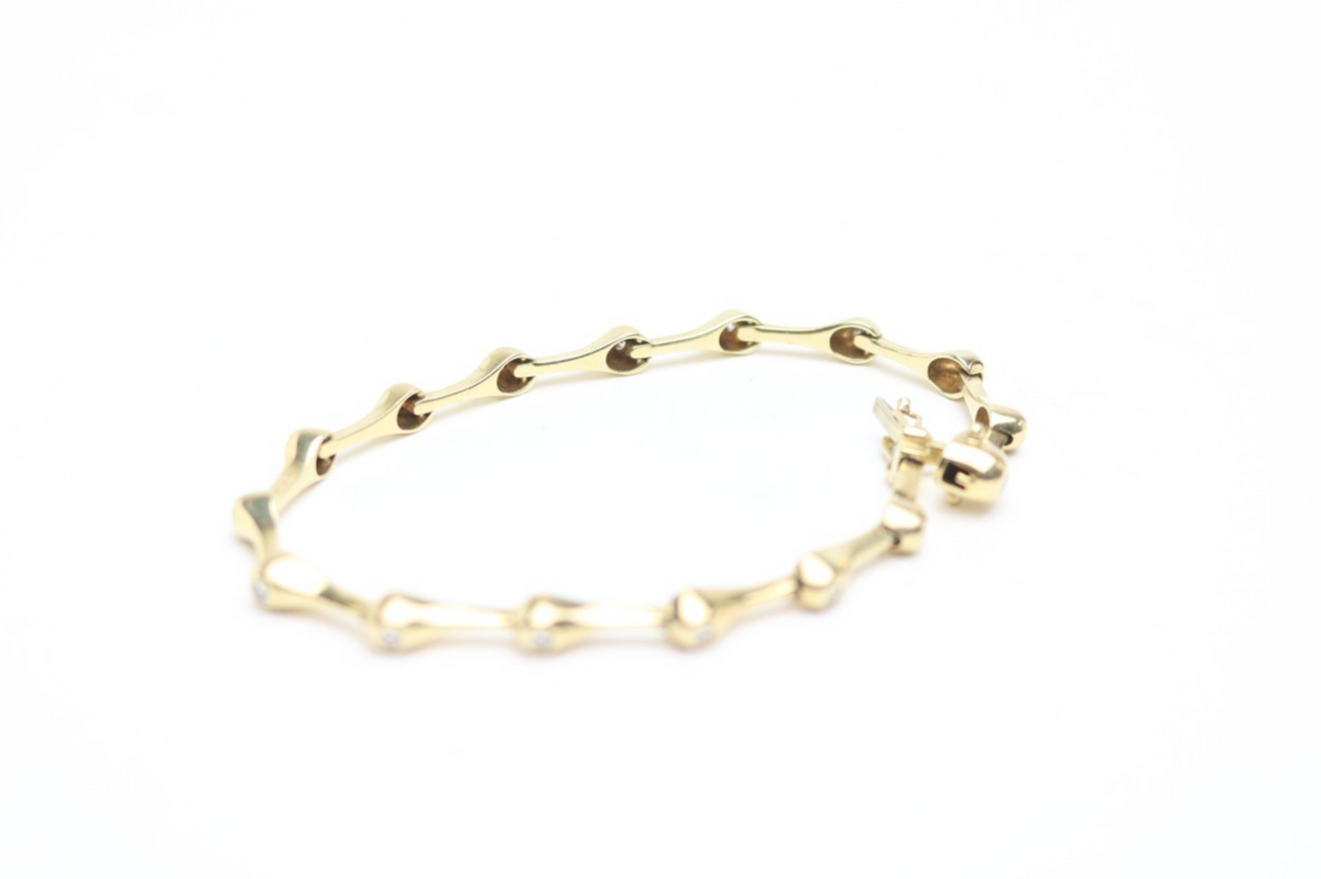 Elegantes Tropf Armband für Damen aus 585 Gelbgold mit 15 Diamanten 0.40ct 19cm