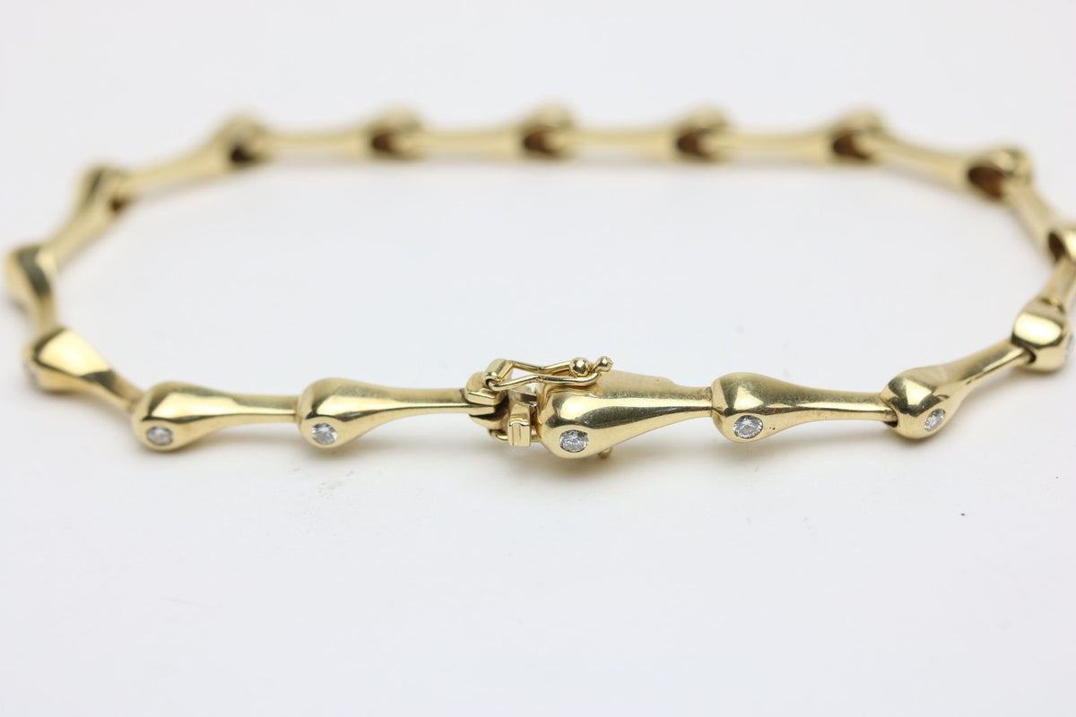 Elegantes Tropf Armband für Damen aus 585 Gelbgold mit 15 Diamanten 0.40ct 19cm