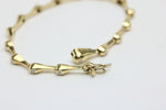 Elegantes Tropf Armband für Damen aus 585 Gelbgold mit 15 Diamanten 0.40ct 19cm