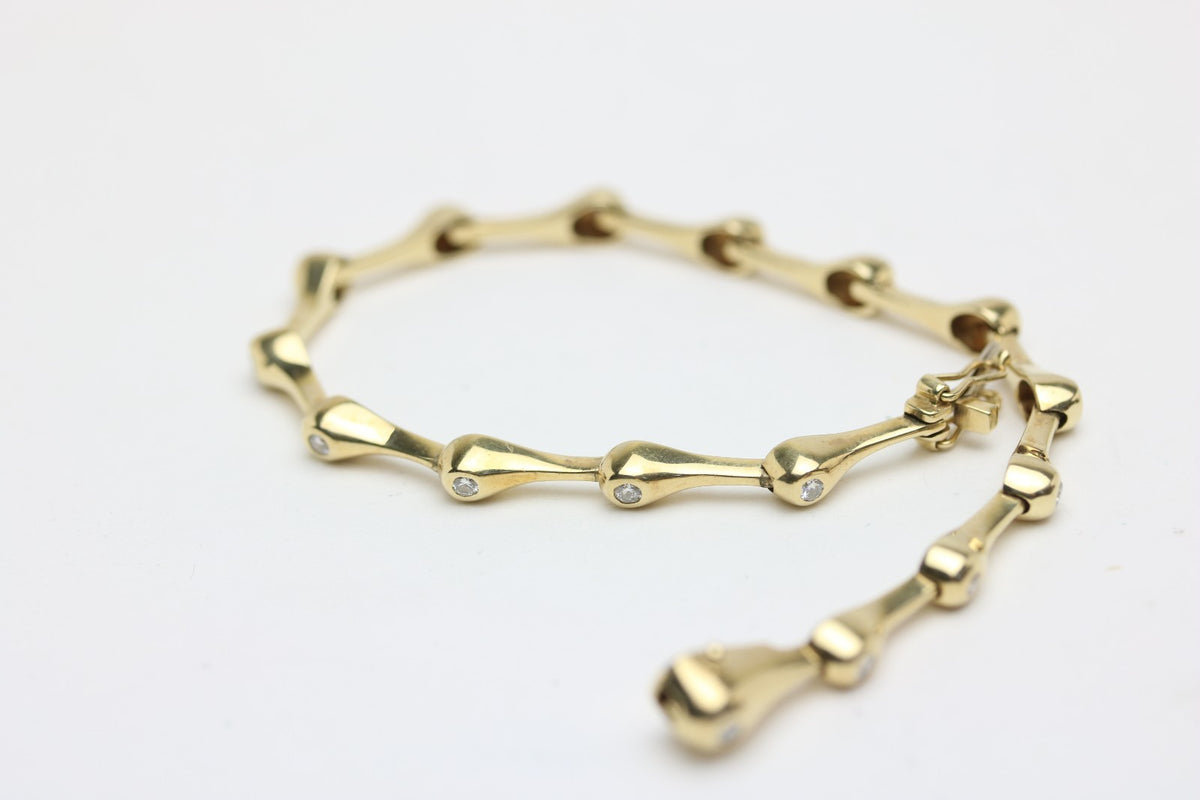 Elegantes Tropf Armband für Damen aus 585 Gelbgold mit 15 Diamanten 0.40ct 19cm