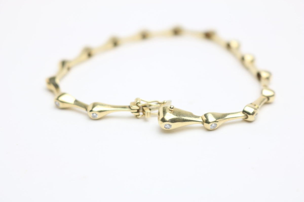 Elegantes Tropf Armband für Damen aus 585 Gelbgold mit 15 Diamanten 0.40ct 19cm