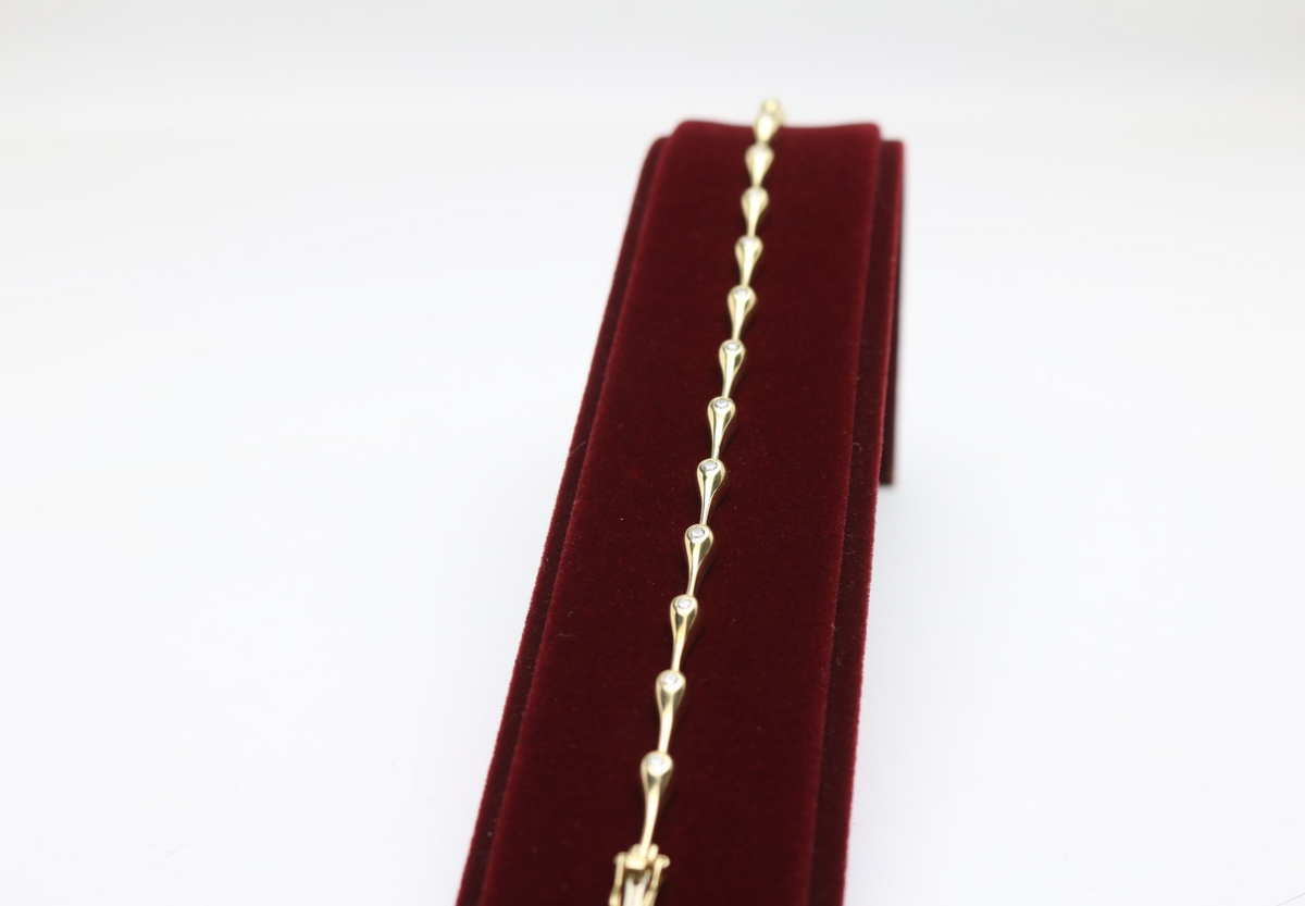 Elegantes Tropf Armband für Damen aus 585 Gelbgold mit 15 Diamanten 0.40ct 19cm