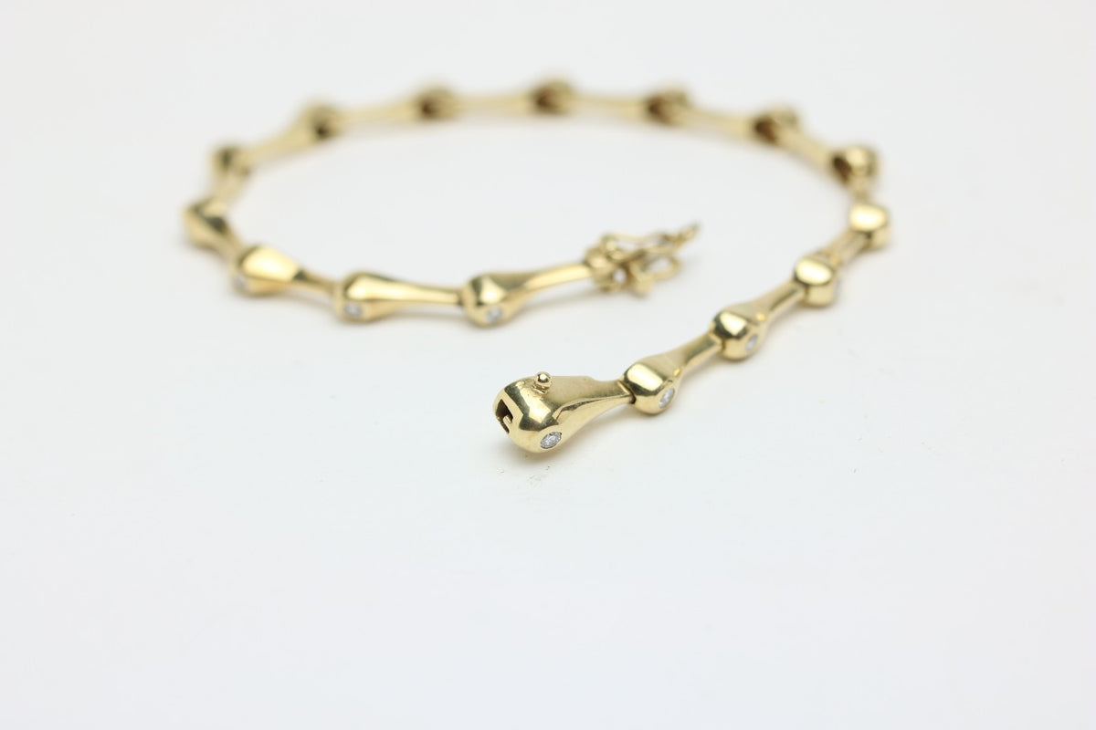 Elegantes Tropf Armband für Damen aus 585 Gelbgold mit 15 Diamanten 0.40ct 19cm